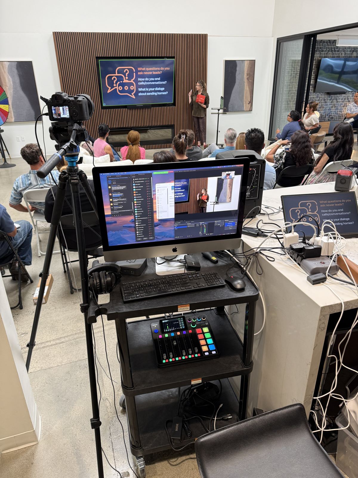 Camera on a tripod filming a live team training